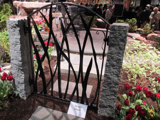 Gate posing as sculpture in the garden.